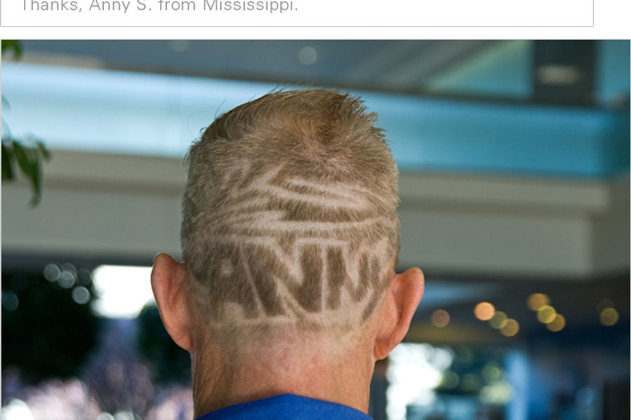 Honda associate with fan's name shaved in their head
